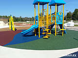 Red, green, and blue poured-in-place rubber surfacing at a park