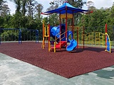 Playground at a daycare installed with bonded-rubber-mulch surfacing